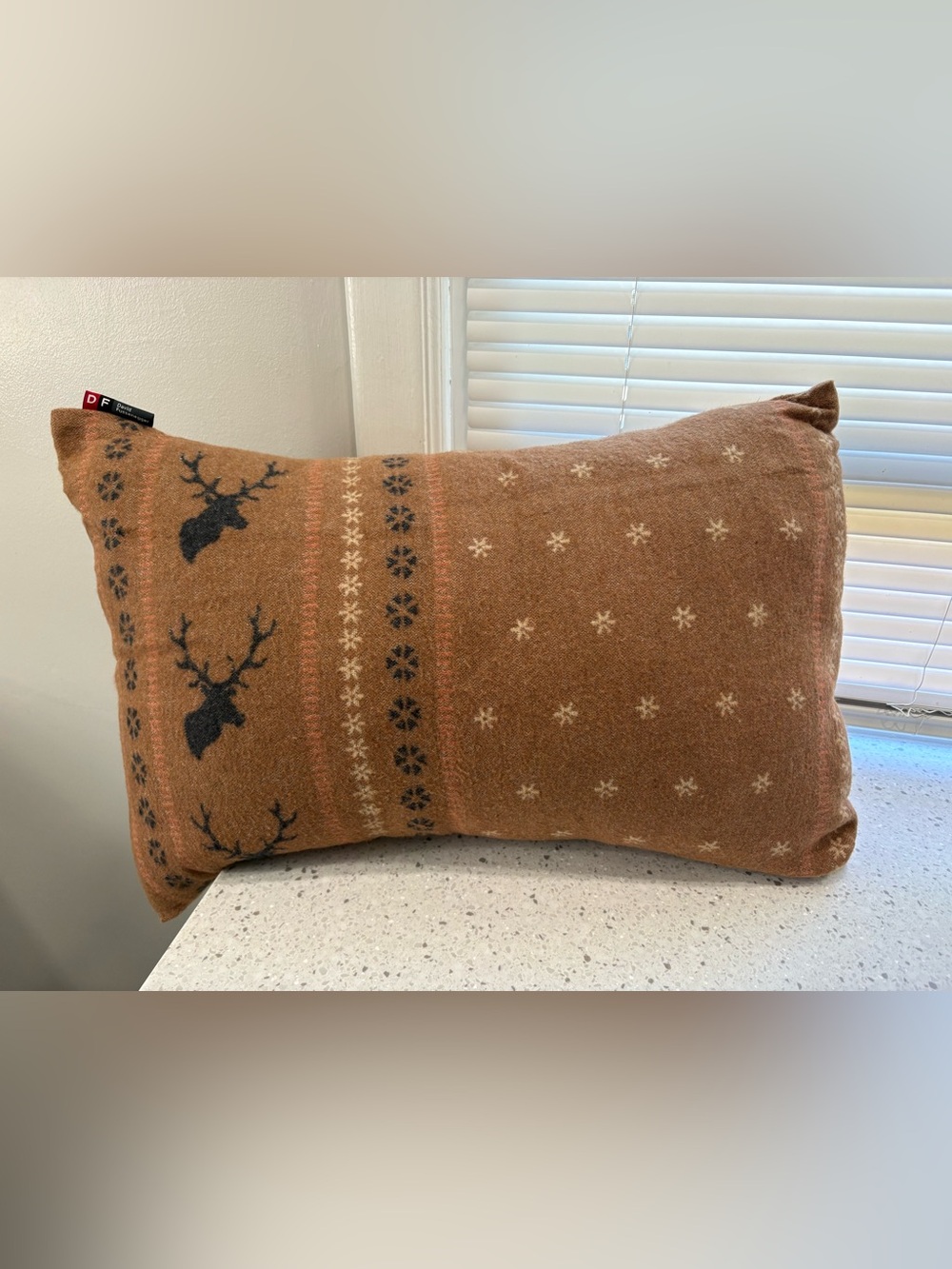 NWT David Fussenegger Cervo pillow featuring a rustic deer/snowflake pattern